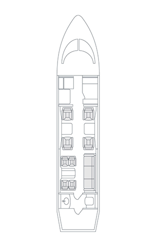 Interior espacioso y lujoso del Challenger 600, ideal para viajes de negocios o placer con hasta 12 pasajeros.