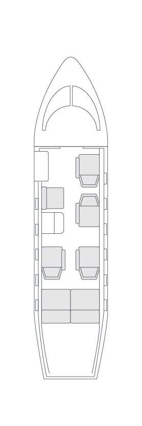 Interior clásico y confortable del Learjet 35, ideal para viajes de negocios o placer con hasta 8 pasajeros.